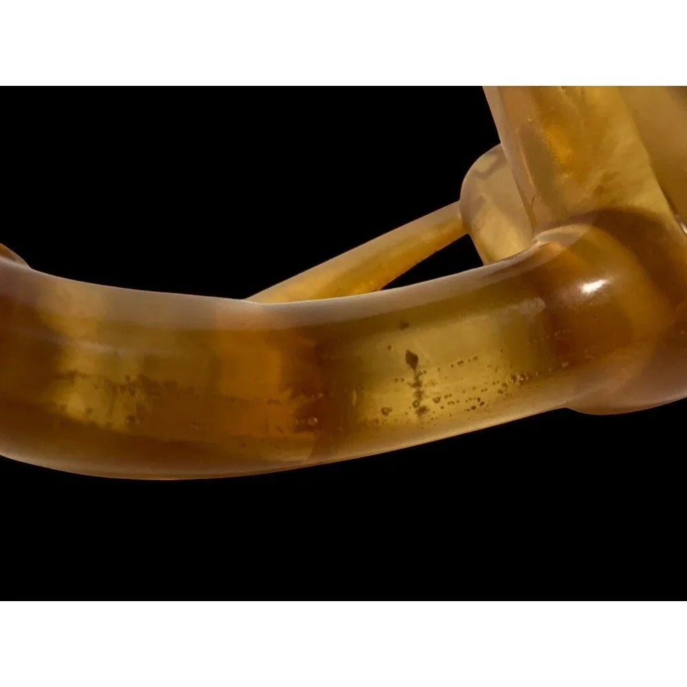 Faceless Lying Down Minimalistic Modern Art StatueYellow Lucite Resin
